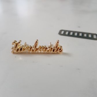 &#039;Handmade&#039; label goud written