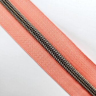 Rits peach met antiek messing/bronzen tandjes