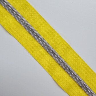 Rits geel met nikkel/zilveren tandjes