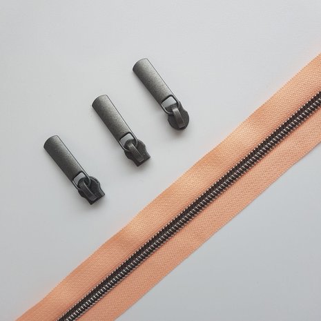 Rits abrikoos roze met mat zwart oxide tandjes